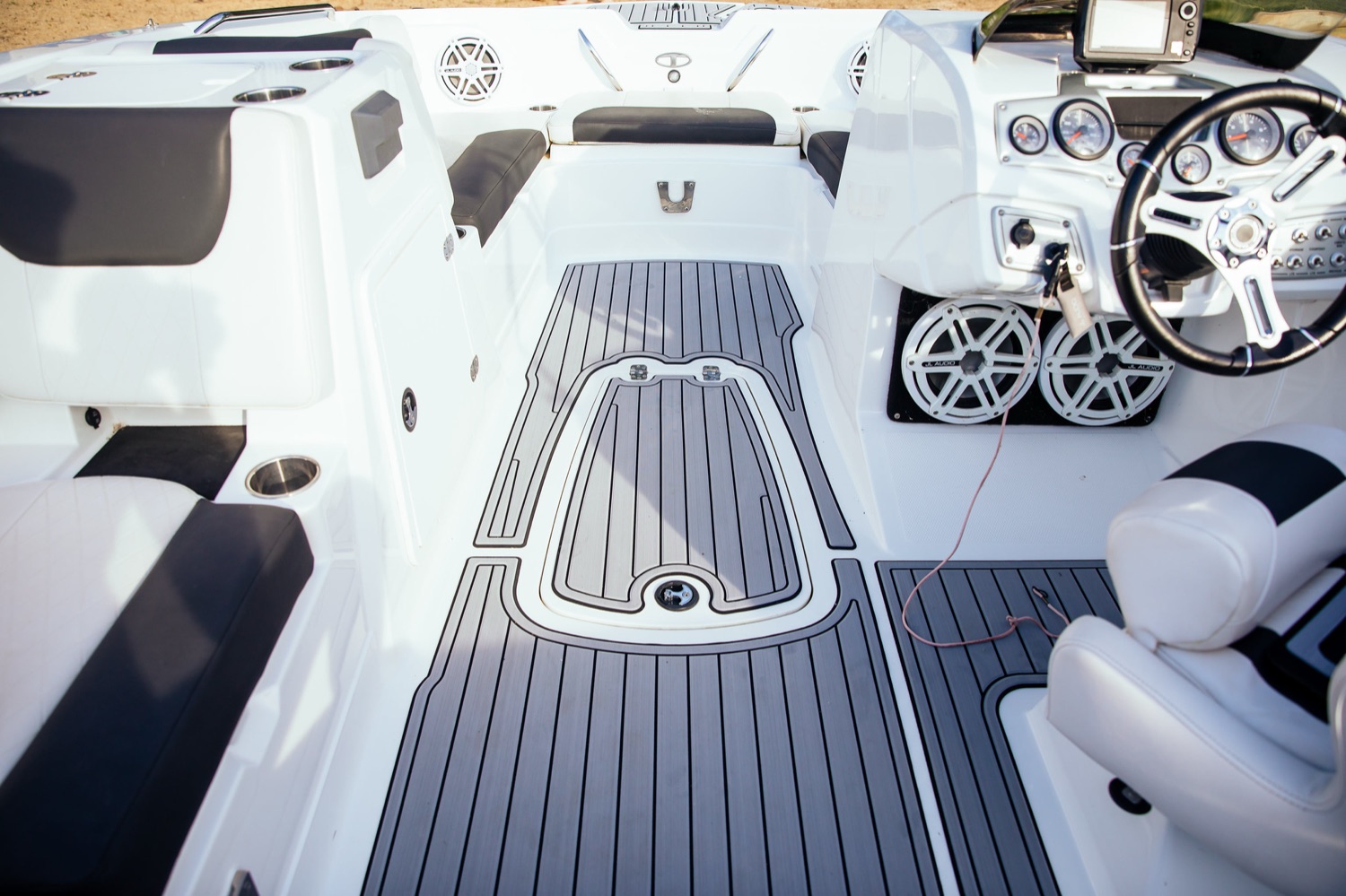 Storm gray over black SeaDek flooring in a lake boat cockpit