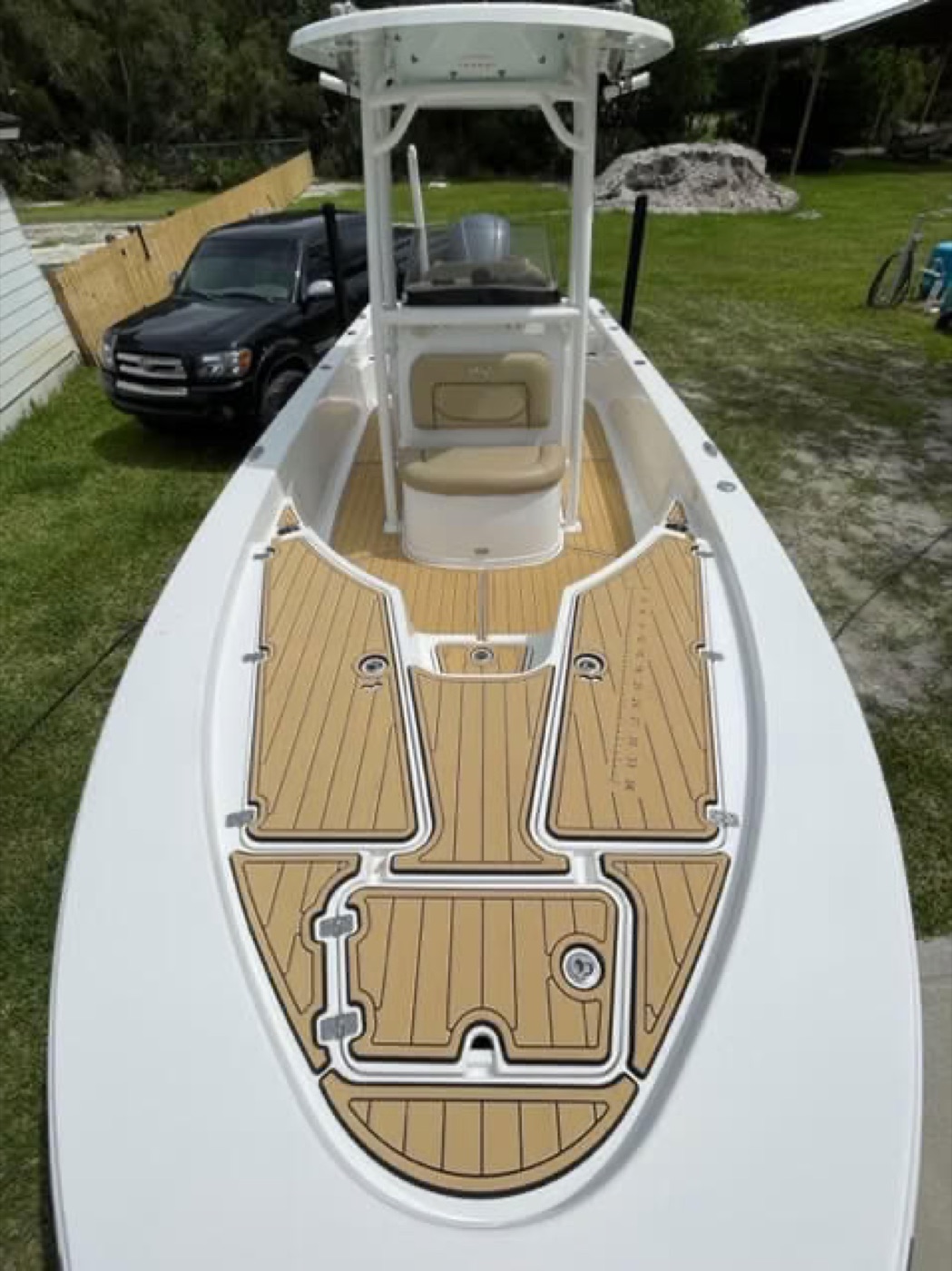 Overhead view of faux-teak SeaDek on a center console